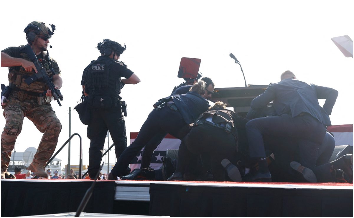 Donald Trump es protegido por el Servicio Secreto luego que intentaron atentar contra su vida. Foto: Anna Moneymaker/AP